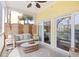 Relaxing porch features an outdoor sofa, ceiling fan, and access to the building's amenities at 601 Hillside Dr. N # 2305, North Myrtle Beach, SC 29582