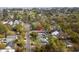 This aerial view highlights the charming neighborhood, showcasing its mature trees, landscaped yards, and convenient street access at 613 Cypress Dr., Surfside Beach, SC 29575