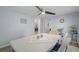 This dining room has natural light, a ceiling fan and neutral paint at 613 Cypress Dr., Surfside Beach, SC 29575