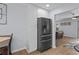 This modern kitchen features a stainless steel refrigerator and lots of storage at 613 Cypress Dr., Surfside Beach, SC 29575