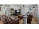 Warm living room with plush seating, a large TV, and stylish decor creating an inviting atmosphere at 613 Cypress Dr., Surfside Beach, SC 29575