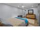 The main bedroom has a large closet, a window, and a ceiling fan at 613 Cypress Dr., Surfside Beach, SC 29575