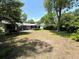 Large backyard with patio, offering plenty of space for recreation and relaxation at 710 62Nd Ave. N, Myrtle Beach, SC 29572