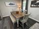 Cozy dining area with wooden table and chairs, bathed in natural light at 710 62Nd Ave. N, Myrtle Beach, SC 29572