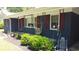 Inviting front porch with charming decor and manicured landscaping at 710 62Nd Ave. N, Myrtle Beach, SC 29572