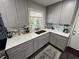 Well-appointed kitchen featuring updated cabinets, quartz countertops, and modern fixtures at 710 62Nd Ave. N, Myrtle Beach, SC 29572