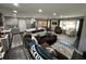 Open concept living space with modern kitchen, dining, and cozy seating area at 710 62Nd Ave. N, Myrtle Beach, SC 29572