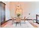 Bright dining area with modern chandelier, seating for four, and stylish décor at 72 Landing Rd. # 0, Pawleys Island, SC 29585