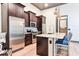 Modern kitchen features stainless steel appliances, granite countertops and a large center island with seating at 72 Landing Rd. # 0, Pawleys Island, SC 29585