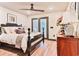 Comfortable main bedroom with a plush bed, natural light and stylish decor at 72 Landing Rd. # 0, Pawleys Island, SC 29585