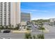 Aerial view of condo, parking, and surrounding neighborhood at 7200 N Ocean Blvd. # 438, Myrtle Beach, SC 29577