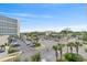 Aerial view of condo, parking, and surrounding neighborhood at 7200 N Ocean Blvd. # 438, Myrtle Beach, SC 29577
