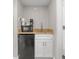 Condo kitchenette with microwave, coffee maker, sink and white cabinets at 7200 N Ocean Blvd. # 438, Myrtle Beach, SC 29577