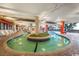 Relaxing lazy river area with a unique island feature and comfortable seating at 7200 N Ocean Blvd. # 438, Myrtle Beach, SC 29577
