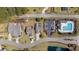 Overhead view of the property highlighting the home, pool, and proximity to community features at 90 Carolina Crossing Blvd., Little River, SC 29566