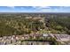 Panoramic aerial view showing the property in relation to the pool and surrounding community amenities at 90 Carolina Crossing Blvd., Little River, SC 29566