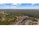 Aerial view showcasing property and community features surrounded by lush greenery at 90 Carolina Crossing Blvd., Little River, SC 29566
