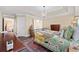 Inviting bedroom with decorative rug, chandelier and patterned wallpaper at 90 Carolina Crossing Blvd., Little River, SC 29566