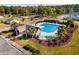 Community pool area showcasing the pool, clubhouse, and surrounding landscaping at 90 Carolina Crossing Blvd., Little River, SC 29566