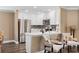 Modern kitchen with stainless steel appliances, white cabinets, and stylish backsplash at 90 Carolina Crossing Blvd., Little River, SC 29566