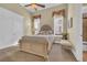 Cozy bedroom featuring a ceiling fan, carpet flooring, two windows, and a bed with neutral bedding at 9243 Marina Pkwy., Myrtle Beach, SC 29572