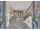 Elegant living room with fireplace, staircase, and a view to the front yard at 9243 Marina Pkwy., Myrtle Beach, SC 29572