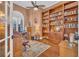 Inviting home office with custom built-in bookshelves and an abundance of natural light at 9243 Marina Pkwy., Myrtle Beach, SC 29572