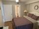 Bedroom featuring queen bed and doorway into ensuite bathroom at 102 N Ocean Blvd. # 903, North Myrtle Beach, SC 29582
