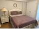 Bedroom with queen bed, nautical decorations and a double closet at 102 N Ocean Blvd. # 903, North Myrtle Beach, SC 29582