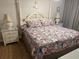 Calm and inviting main bedroom with soft lighting and hardwood floors at 102 N Ocean Blvd. # 903, North Myrtle Beach, SC 29582