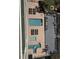Aerial view of multiple pools, hot tub, and seating at 102 N Ocean Blvd. # 903, North Myrtle Beach, SC 29582