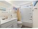 Bathroom featuring white vanity, tub-shower combination with shower curtain, and toilet at 1101 Bronwyn Circle, North Myrtle Beach, SC 29582