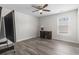 A flexible bedroom with a ceiling fan, desk, and table tennis conversion offers space for work or play at 1101 Bronwyn Circle, North Myrtle Beach, SC 29582
