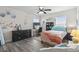 Bedroom with stylish wood-look floors, a window, a ceiling fan, and a modern-style desk at 1101 Bronwyn Circle, North Myrtle Beach, SC 29582