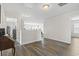 The hallway features hardwood floors, recessed lighting, and seamless transitions between living spaces at 1101 Bronwyn Circle, North Myrtle Beach, SC 29582
