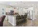 Modern kitchen showcasing an island with granite countertops, stainless steel appliances, and ample cabinet space at 1101 Bronwyn Circle, North Myrtle Beach, SC 29582