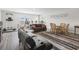 A multi-purpose living room offers an area for dining, relaxing, and exercising at 1101 Bronwyn Circle, North Myrtle Beach, SC 29582