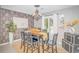 Elegant dining room featuring stylish decor, modern lighting, and seating for six at 111 Hickory Dr., Conway, SC 29526