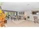 Spacious living room with tile floors, large windows, and comfortable seating arrangement at 111 Hickory Dr., Conway, SC 29526
