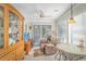 Cozy sun room with comfortable seating, bright windows, and access to the outdoors at 111 Hickory Dr., Conway, SC 29526