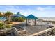 Inviting beach deck provides a relaxed setting for dining and socializing by the ocean at 12 Spartina Ct. # 2, Pawleys Island, SC 29585