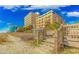Beach access walkway with stairs and a sign reading 13th Avenue at 1207 S Ocean Blvd. S # 507013, Myrtle Beach, SC 29577