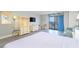 Well-lit room with balcony, wardrobe, and modern decor at 1207 S Ocean Blvd. S # 507013, Myrtle Beach, SC 29577