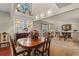 Light-filled dining room open to living room with large window at 1213 Oak St., Conway, SC 29526