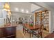 Open concept with dining room and views to living room and built in bookshelves at 1213 Oak St., Conway, SC 29526