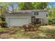 Charming two-story home featuring a two-car garage and a cozy front porch at 1213 Oak St., Conway, SC 29526