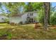 Charming home featuring a well-maintained lawn and colorful landscaping for great curb appeal at 1213 Oak St., Conway, SC 29526