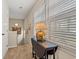 Hallway landing with table and lamp, highlighting a carpeted staircase and access to bedrooms at 1213 Oak St., Conway, SC 29526