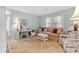 Versatile bedroom or living area with a comfortable couch, desk, and neutral tones at 1213 Oak St., Conway, SC 29526