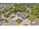 Aerial view of the property, showcasing the home's exterior and a lovely pond at 1501 Palmina Loop # B, Myrtle Beach, SC 29588